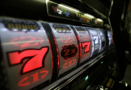 777 on the scoreboard of a slot machine